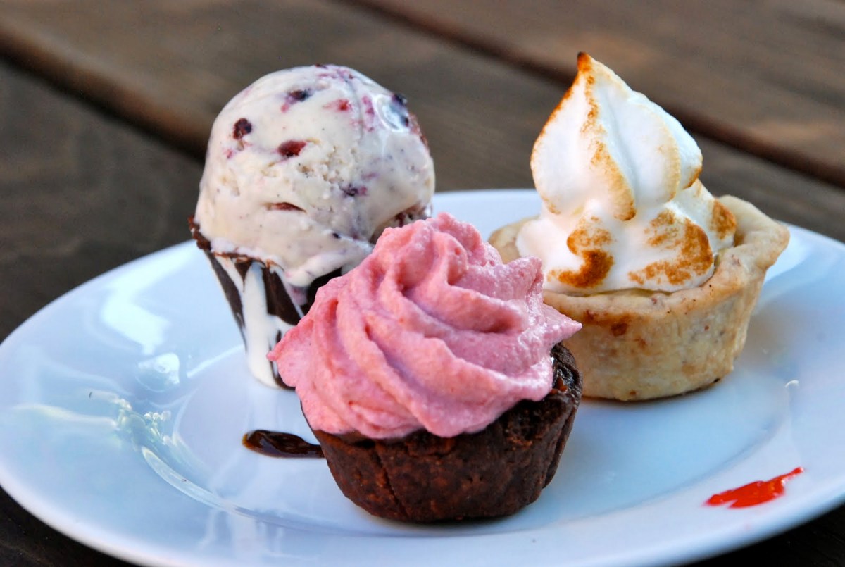Mini Dessert Trio: Lemon Meringue Pie, Raspberry Cheesecake ice Cream in Chocolate Cup, and Strawberry Chocolate Cream Tart