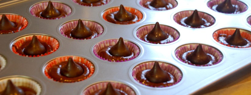 Mini chocolate cupcakes with mint hershey kisses baked into each one