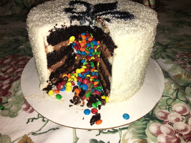 Fun chocolate non-traditional wedding cake with m&m's hidden inside.